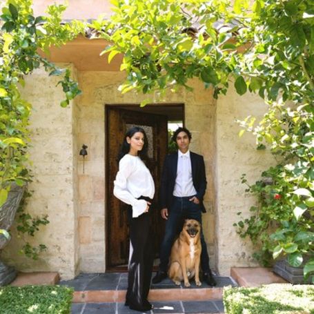 Kunal and Neha with their dog at their resident.